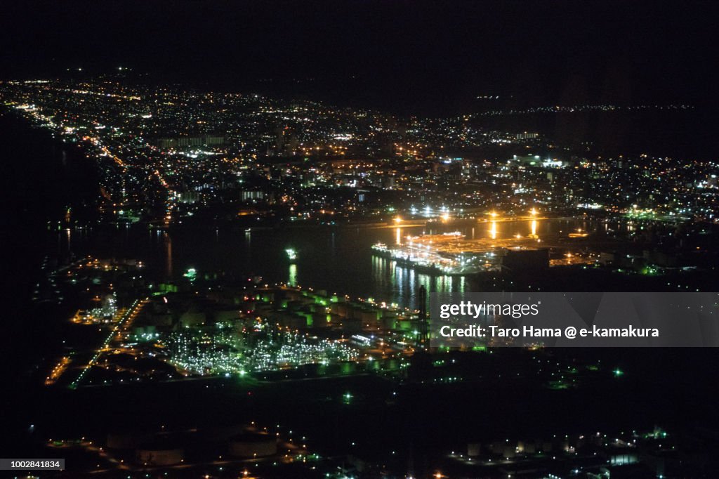 Tomakomai city in Hokkaido night time aerial view from airplane
