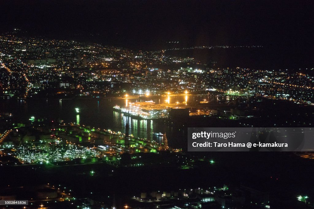 Tomakomai city in Hokkaido night time aerial view from airplane