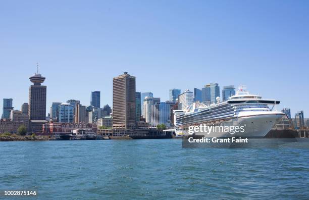 view of vancouver harbour area mid day. - vancouver canada place stock pictures, royalty-free photos & images