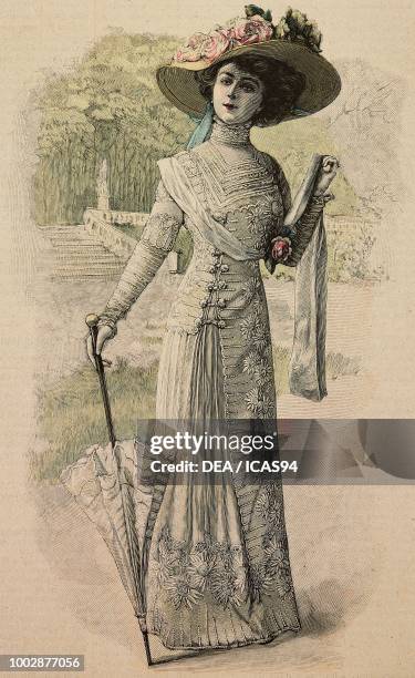 Woman wearing an elegant Spa town dress, in white muslin and embroidered tulle, with trimmings and Valenciennes lace, hat with flowers, creation by...