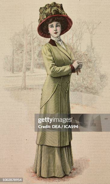 Woman wearing a green fabric city dress, round skirt, coat with buttons and a hat with ribbons, creation by Green, colored engraving from La Mode...