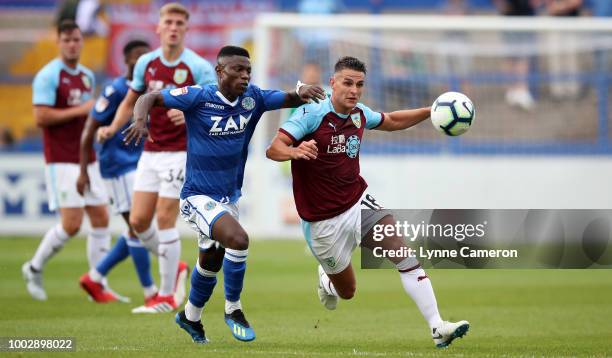 Ashley Westwood of Burnley and Koby Arthur of Macclesfield Town during the Pre-Season Friendly between Macclesfield Town and Burnley at Moss Rose on...