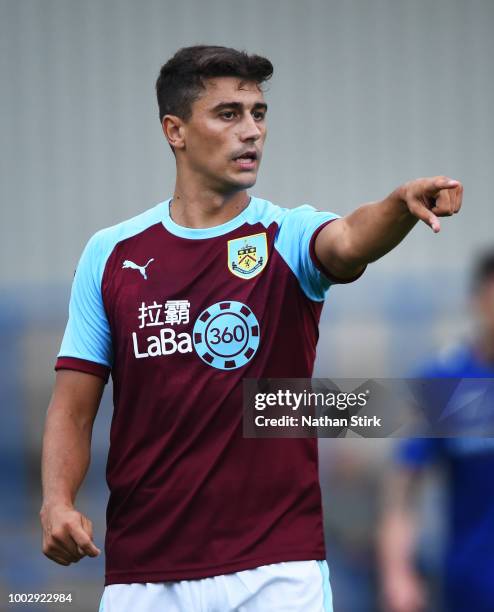 Matt Lowton of Burnley gives his team mates instructions during a pre-season friendly match between Curzon Ashton and Burnley at Tameside Stadium on...