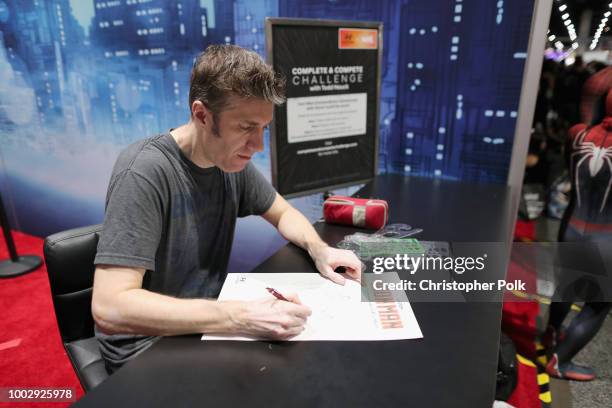 Marvel artist, Todd Nauck, signs autographs for fans during Hyundais Complete and Compete Illustration Challenge, in celebration of the Kona Iron...