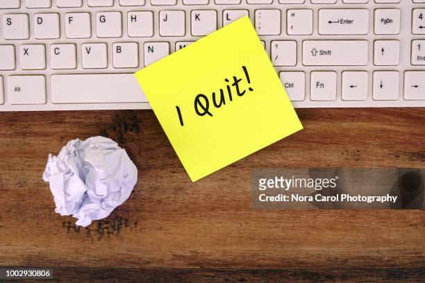 i quit text on yellow note - furious stock pictures, royalty-free photos & images