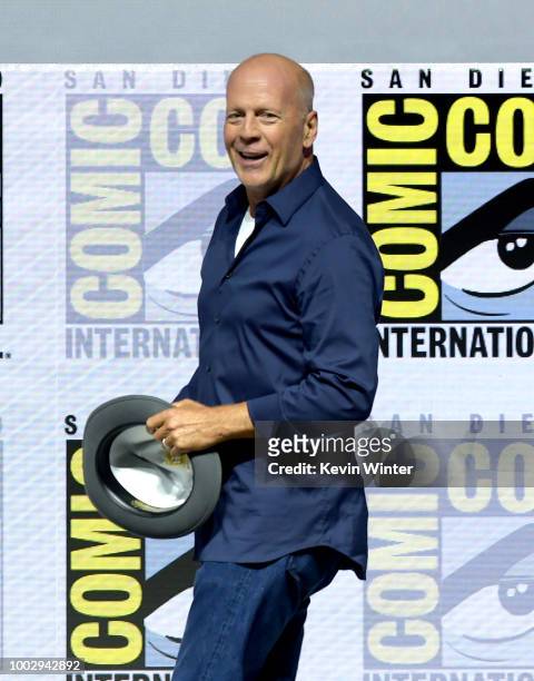 Bruce Willis speaks onstage at the Universal Pictures' "Glass" and "Halloween" panels during Comic-Con International 2018 at San Diego Convention...