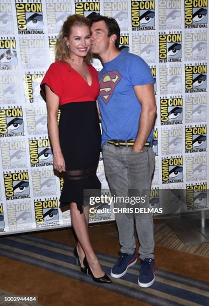 Actor Jerry O'Connell and US actress Rebecca Romijn arrive for the press line of The Death of Superman at Comic Con in San Diego, California on July...