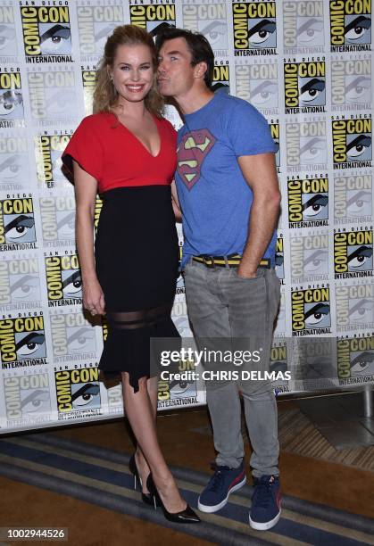 Actor Jerry O'Connell and US actress Rebecca Romijn arrive for the press line of The Death of Superman at Comic Con in San Diego, California on July...