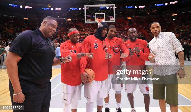 The team Trilogy displays their championship rings after they were presented to them in a ceremony before they played in a game during Big 3-Week...