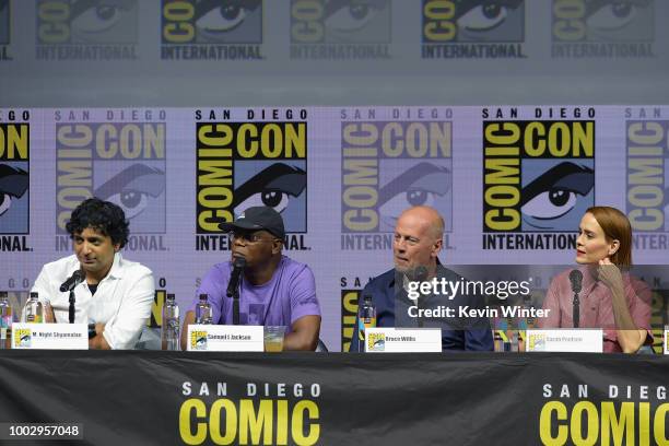 Night Shyamalan, Samuel L. Jackson, Bruce Willis, and Sarah Paulson speak onstage at Universal Pictures' "Glass" and "Halloween" panels during...