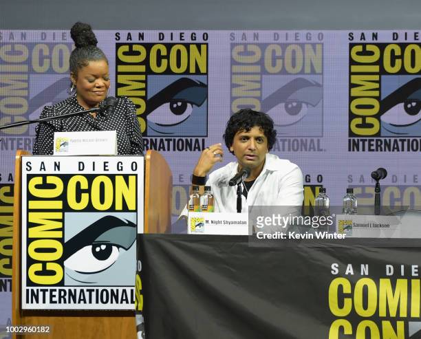 Yvette Nicole Brown and M. Night Shyamalan speak onstage at Universal Pictures' "Glass" and "Halloween" panels during Comic-Con International 2018 at...