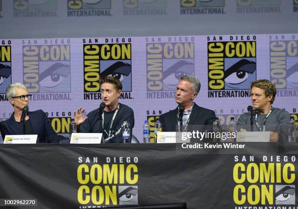 Jamie Lee Curtis, David Gordon Green, Malek Akkad, and Jason Blum speak onstage at Universal Pictures' "Glass" and "Halloween" panels during...