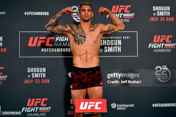 Aleksandar Rakic of Austria poses on the scale during the UFC Fight Night Weigh-in event at the Radisson Blu Hotel on July 21, 2018 in Hamburg,...