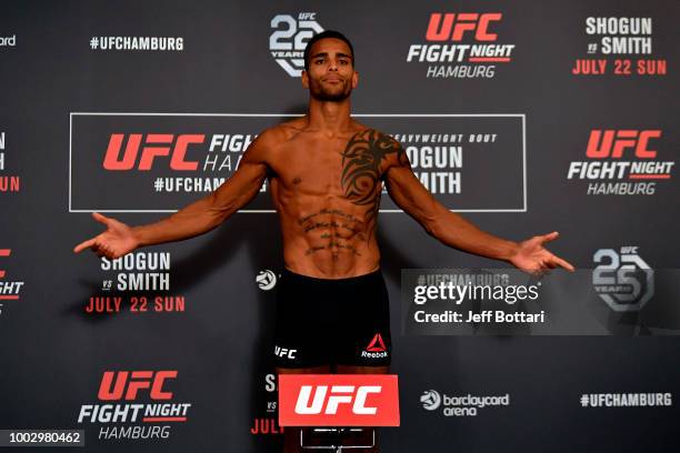 Danny Roberts of England poses on the scale during the UFC Fight Night Weigh-in event at the Radisson Blu Hotel on July 21, 2018 in Hamburg, Germany.