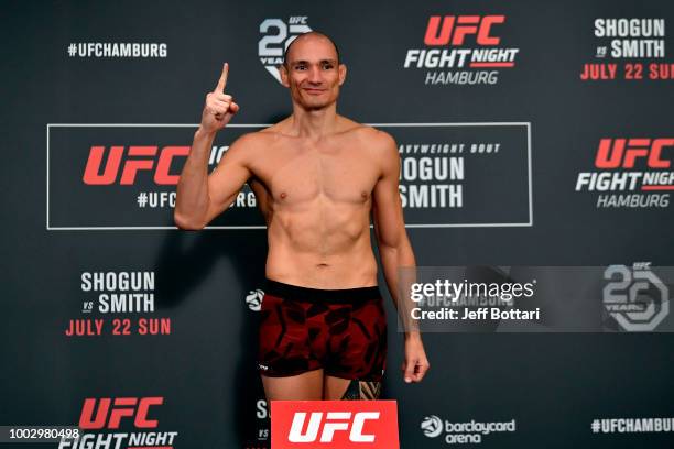 Vitor Miranda of Brazil poses on the scale during the UFC Fight Night Weigh-in event at the Radisson Blu Hotel on July 21, 2018 in Hamburg, Germany.