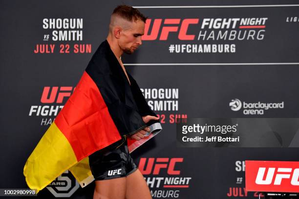 Nick Hein of Germany poses on the scale during the UFC Fight Night Weigh-in event at the Radisson Blu Hotel on July 21, 2018 in Hamburg, Germany.