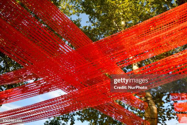 Decorations hang between trees as community members celebrate summer at the Oval, on the Benjamin Franklin Parkway, in Philadelphia, PA on July 20,...