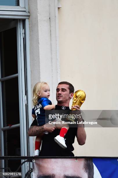 Antoine Griezmann with his daughter celebrates France victory in World Cup in his hometown on July 20, 2018 in Macon, France.