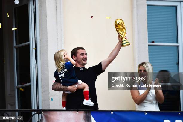 Antoine Griezmann with his daughter and Erika Choperena, wife of Antoine Griezmann celebrates France victory in World Cup in his hometown on July 20,...