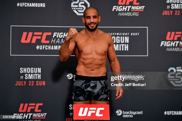 Abu Azaitar of Germany poses on the scale during the UFC Fight Night Weigh-in event at the Radisson Blu Hotel on July 21, 2018 in Hamburg, Germany.