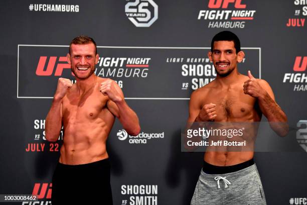 Opponents Davey Grant of England and Manny Bermudez pose for the media during the UFC Fight Night Weigh-in event at the Radisson Blu Hotel on July...