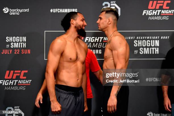 Opponents Justin Ledet and Aleksandar Rakic of Austria face off during the UFC Fight Night Weigh-in event at the Radisson Blu Hotel on July 21, 2018...