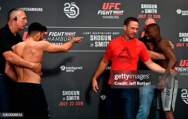 Nasrat Haqparast of Germany and Marc Diakiese of Congo face off during the UFC Fight Night Weigh-in event at the Radisson Blu Hotel on July 21, 2018...