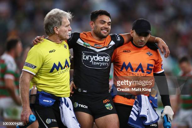 David Nofoaluma of the Tigers leaves the field injured during the round 19 NRL match between the Wests Tigers and the South Sydney Rabbitohs at ANZ...