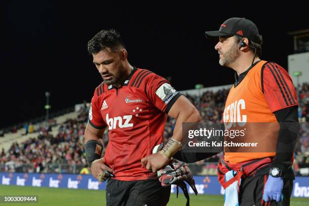 Jordan Taufua of the Crusaders receives medical help from Team Doctor Dr. Martin Swan of the Crusaders during the Super Rugby Qualifying Final match...