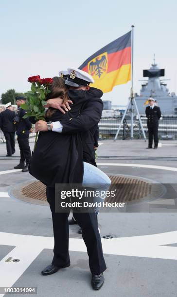 Petty officer first class Antonio Weber is kissed by his girl friend Laura aboard the Bundeswehr Navy frigate "Hessen" upon its return to port on...