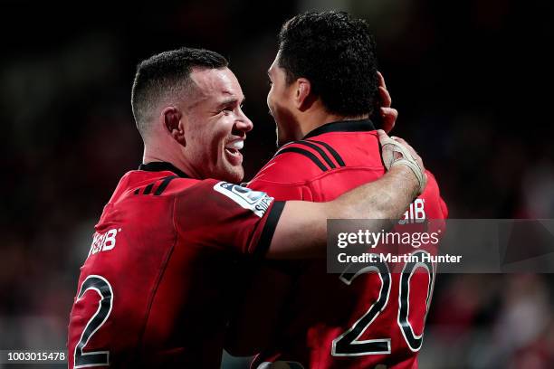 Ryan Crotty of the Crusaders celebrates with his team mate Pete Samu after during the Super Rugby Qualifying Final match between the Crusaders and...