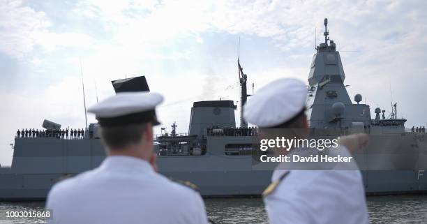 Navy officers are following the Bundeswehr Navy frigate "Hessen" upon its return to port on July 21, 2018 in Wilhelmshaven, Germany. The "Hessen" is...