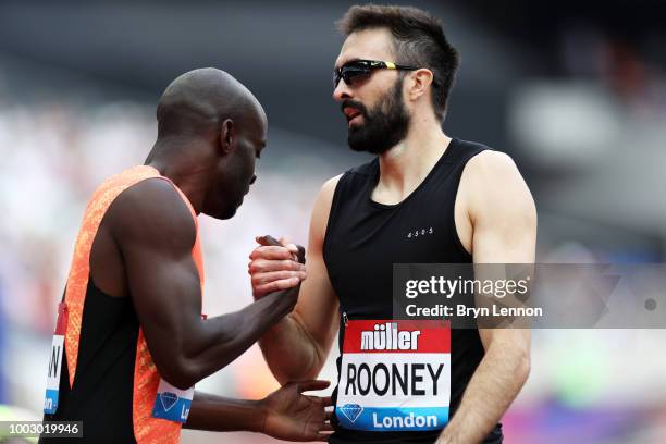 Dwayne Cowan of Great Britain and Martyn Rooney of Great Britain shake hands after the 400M Mens National during Day One of the Muller Anniversary...