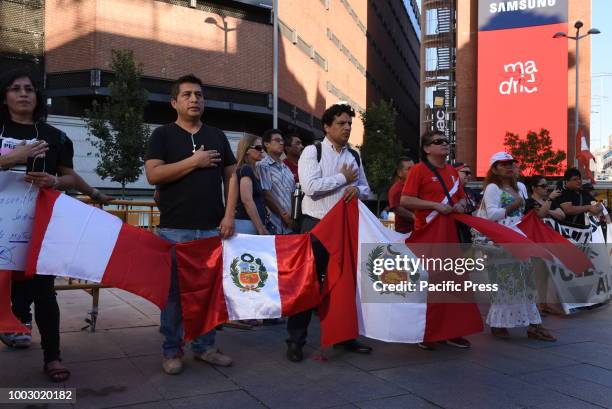 Peruvians pictured during a protest in Madrid against government corruption in Perú, following the scandal of audios of judges negotiating sentences...