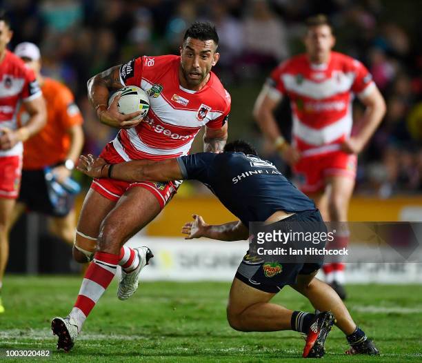 Paul Vaughan of the Dragons is tackled during the round 19 NRL match between the North Queensland Cowboys and the St George Illawarra Dragons at...