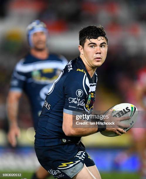 Jake Clifford of the Cowboys runs the ball during the round 19 NRL match between the North Queensland Cowboys and the St George Illawarra Dragons at...