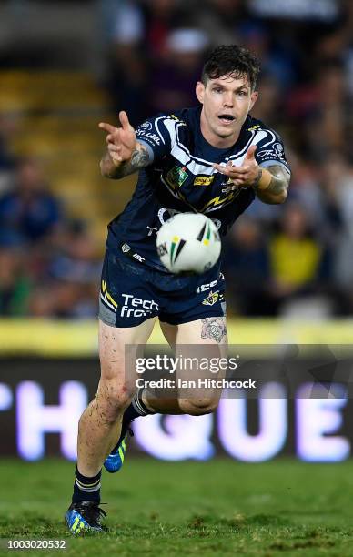 Ben Hampton of the Cowboys passes the ball during the round 19 NRL match between the North Queensland Cowboys and the St George Illawarra Dragons at...