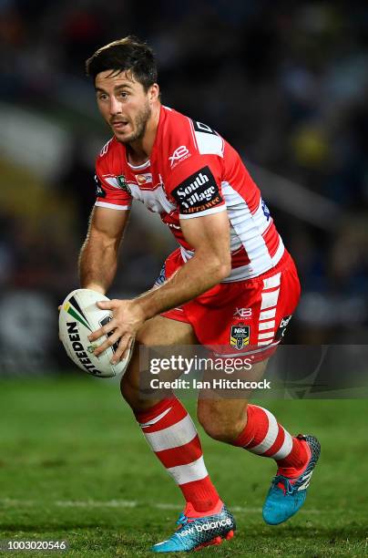 Ben Hunt of the Dragons runs the ball during the round 19 NRL match between the North Queensland Cowboys and the St George Illawarra Dragons at...