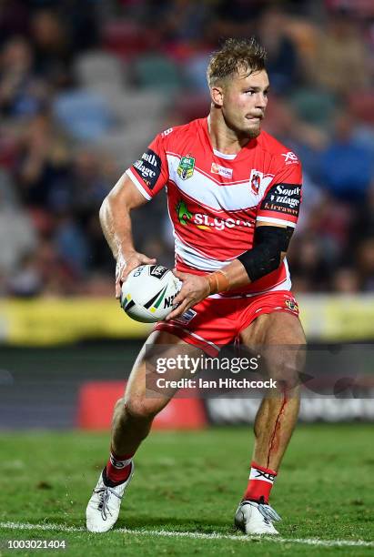 Jack de Belin of the Dragons looks to pass the ball during the round 19 NRL match between the North Queensland Cowboys and the St George Illawarra...