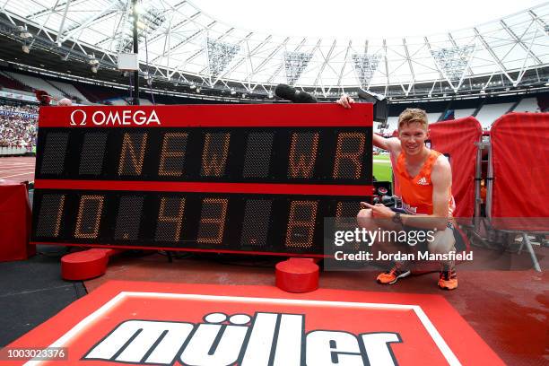 Tom Bosworth of Great Britain celebrates victory and a new World Record in the Mens 3000M Walk Race during Day One of the Muller Anniversary Games at...