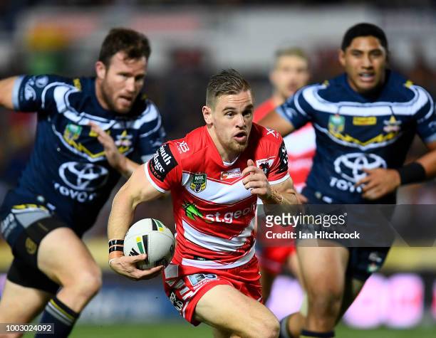 Matt Dufty of the Dragons runs the ball during the round 19 NRL match between the North Queensland Cowboys and the St George Illawarra Dragons at...