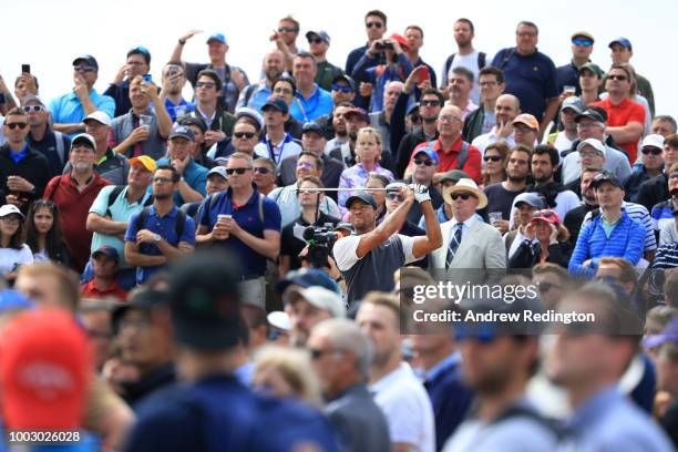 Tiger Woods of the United States plays his shot from the fifth tee during the third round of the 147th Open Championship at Carnoustie Golf Club on...