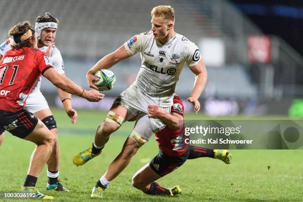 Daniel du Preez of the Sharks is tackled during the Super Rugby Qualifying Final match between the Crusaders and the Sharks at AMI Stadium on July...