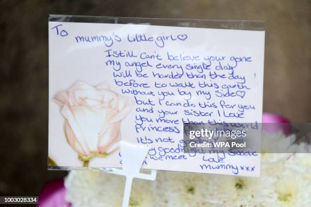 Note on flowers from mother Georgina Lochrane at the funeral of six-year-old Alesha MacPhail at the Coats Funeral Home on July 21, 2018 in...