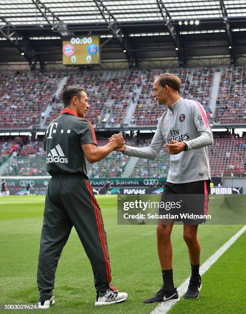 Niko Kovac, Manager of Bayern Muich shakes hands with Thomas Tuchel, Manager of PSG prior to kick off during the International Champions Cup 2018...