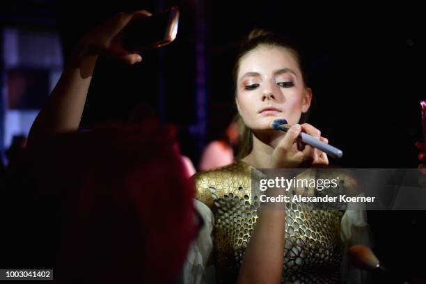 Model is seen backstage ahead the Fashionyard show during Platform Fashion July 2018 at Areal Boehler on July 21, 2018 in Duesseldorf, Germany.