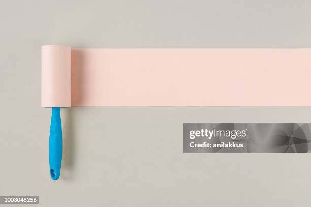 conceptual still life with lint roller - clean slate stock pictures, royalty-free photos & images