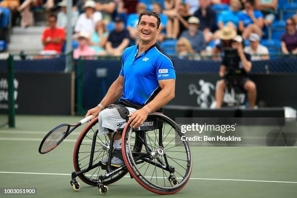 Gustavo Fernandez of Argentina reacts during the final of the men's doubles against Joachim Gerard of Belgium and Stefan Olsson of Sweden during day...