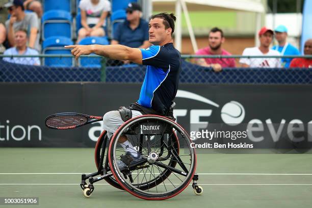 Gustavo Fernandez of Argentina reacts during the final of the men's doubles against Joachim Gerard of Belgium and Stefan Olsson of Sweden during day...