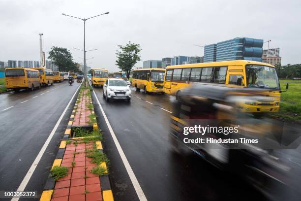 Intercity private buses seen parked in line on the roads during Nationwide Transport Strike at Bandra-Kurla complex, on July 20, 2018 in Mumbai,...